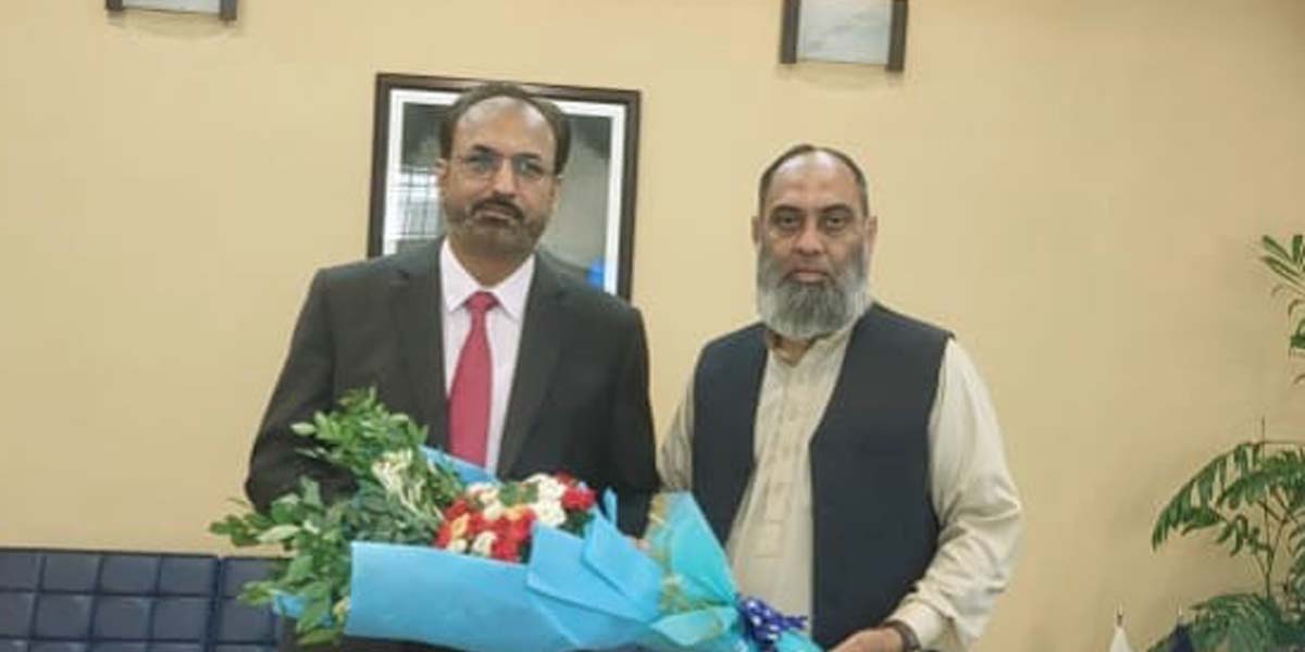 Dr. H. Abdul Ghaffar, Head of Islamic Studies at University of Okara, Presents Bouquet to Prof. Dr. Shahid Munir on His Appointment as Vice Chancellor UET