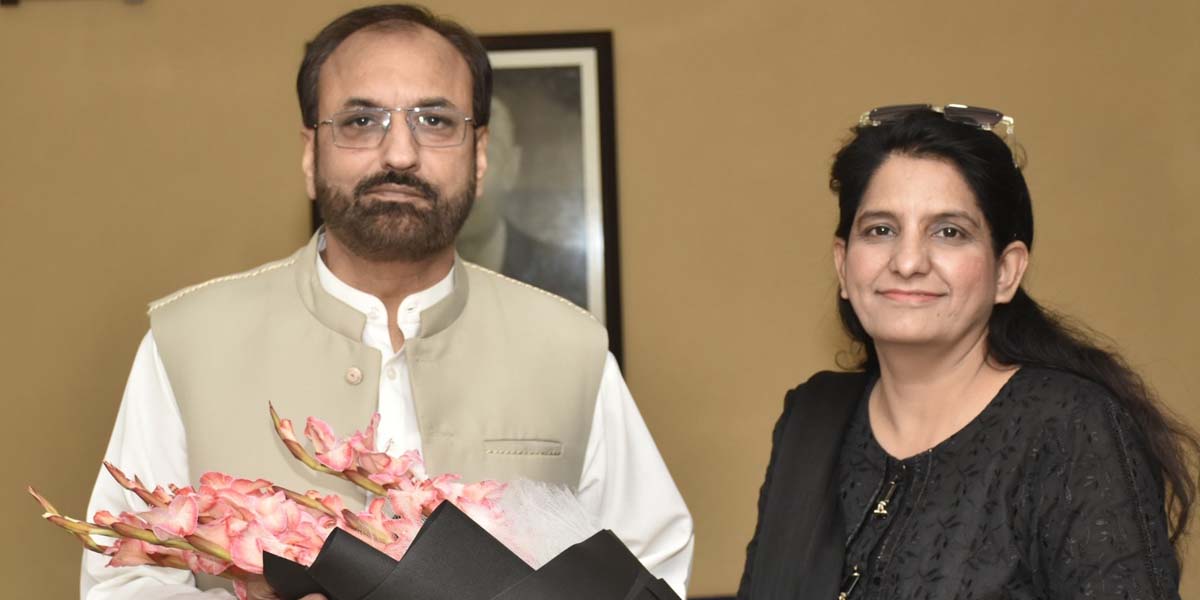 Dr. Nadia from University of Punjab's Department of Kashmiriat Congratulates Prof. Dr. Shahid Munir with a Bouquet on His New Appointment as Vice Chancellor UET Lahore